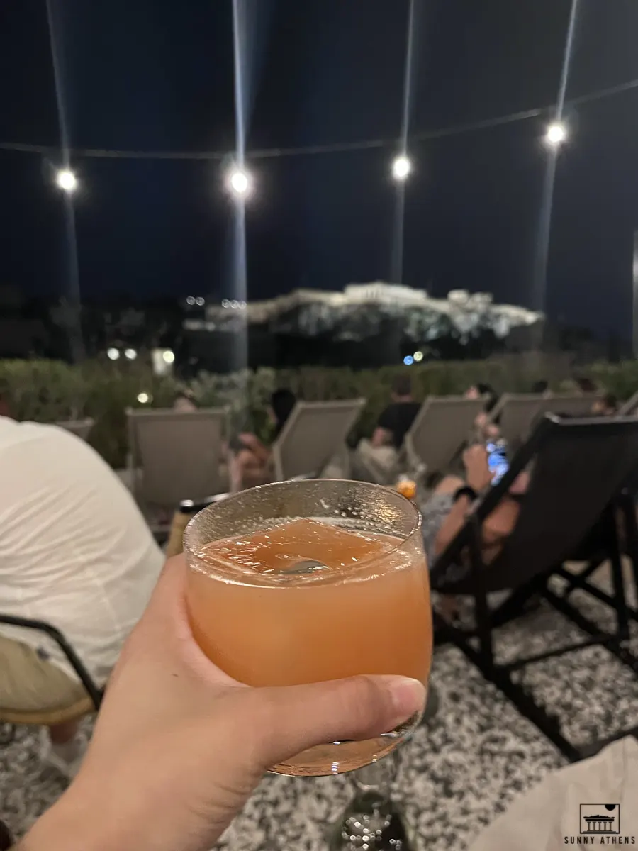 Best Rooftop Bars in Athens: Savoring cocktails with the iconic Acropolis in the backdrop.