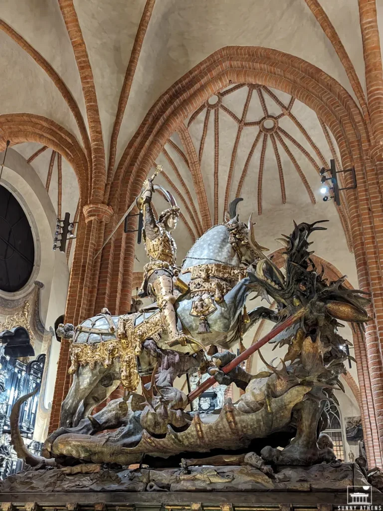 The detailed sculpture of Saint George and the Dragon inside Storkyrkan.