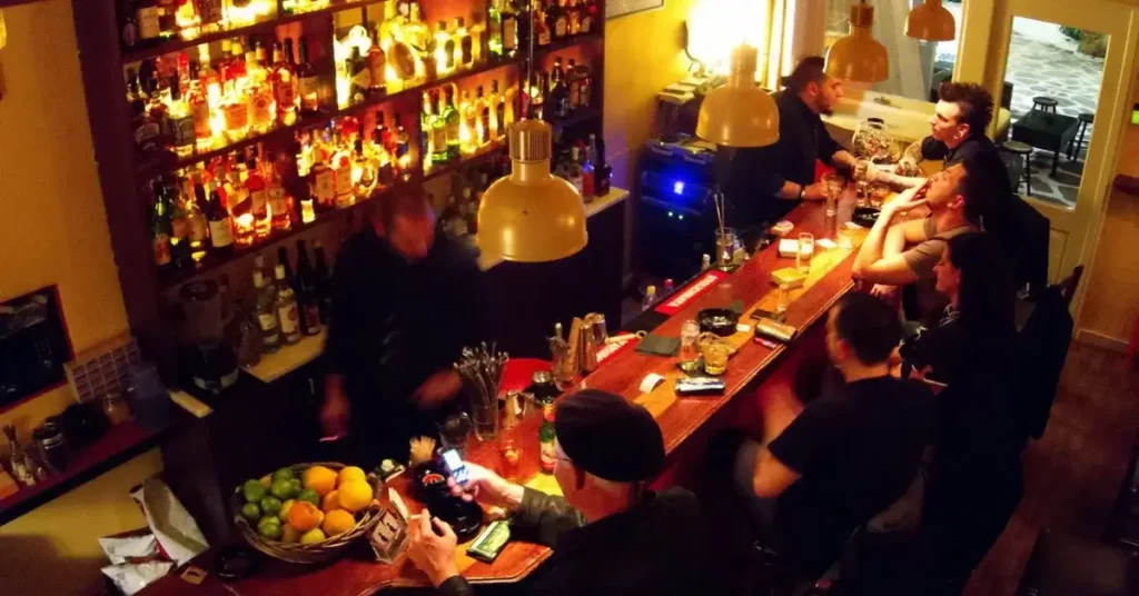 People enjoying their drink in a bar at Paros Greece.