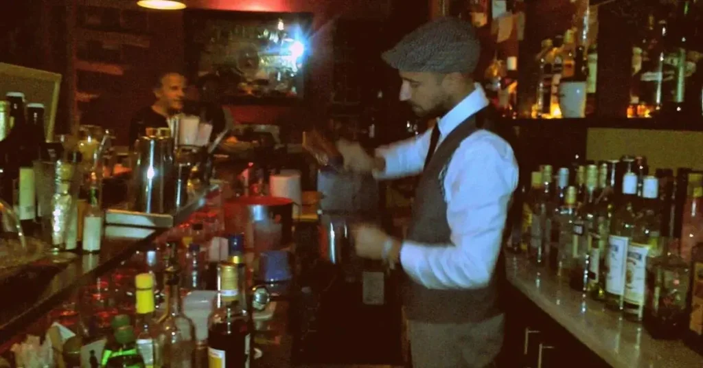 A barman serving cocktails at Booze 'n' Tales in Paroikia Paros.