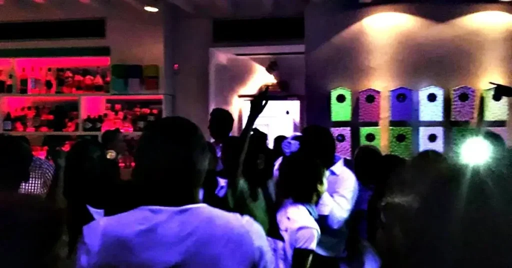 People dancing in a nightclub in Paros, Greece.