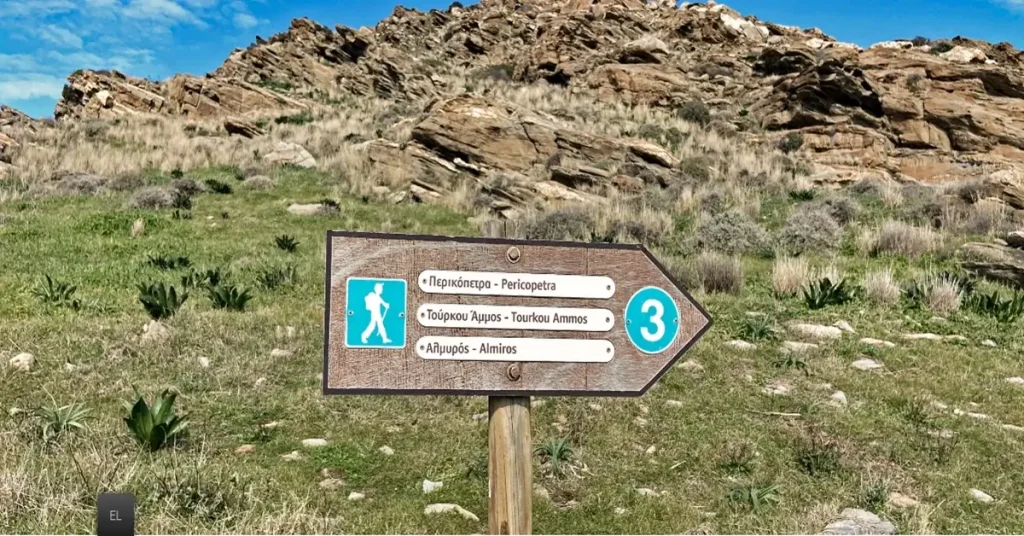 A sign indicating the paths of Paros Park.