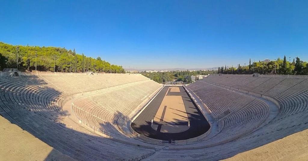 The Panathenaic Stadium in Athens under the morning sun, a good spot to escape the crowds in Athens.