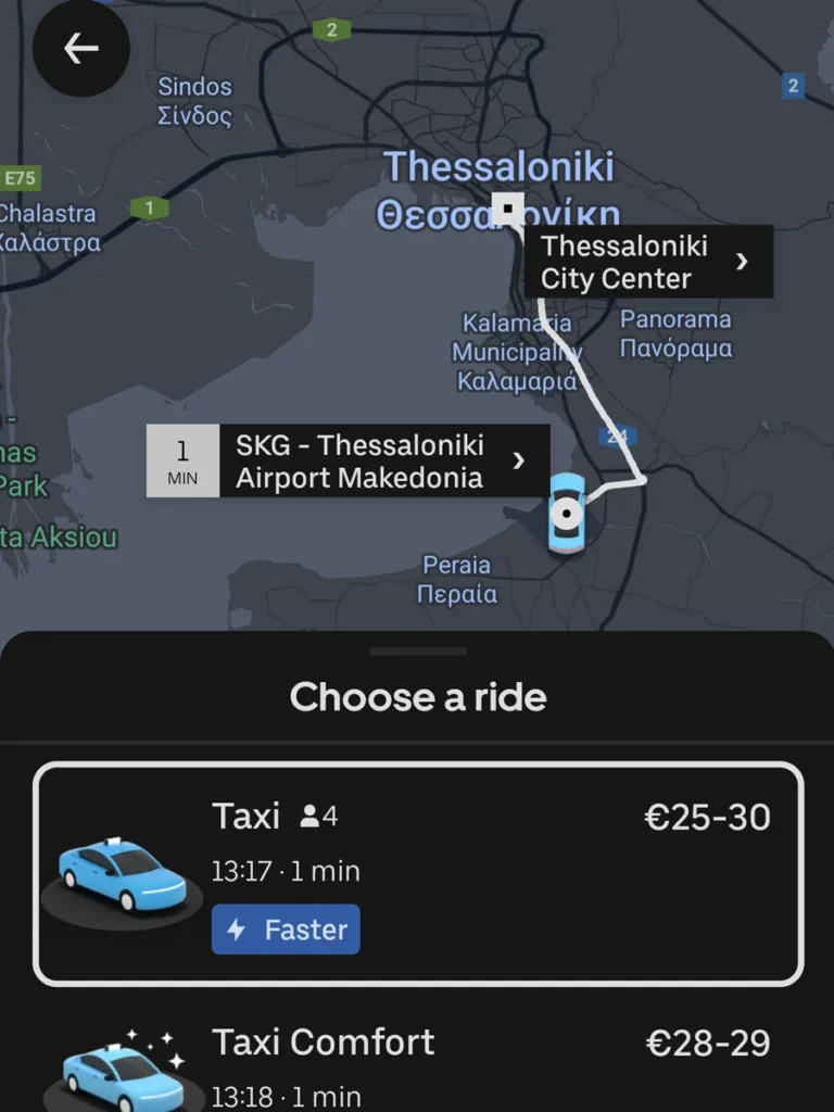 Screenshot of the Uber App showing the cost for a journey between Thessaloniki Airport and Thessaloniki City Center.