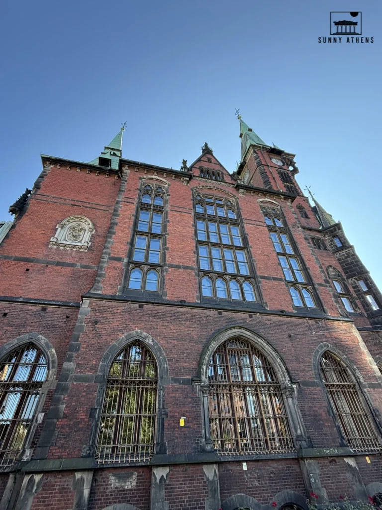 One day in Wroclaw Itinerary: the red brick facade of the old Wroclaw University Library at Solny Square.