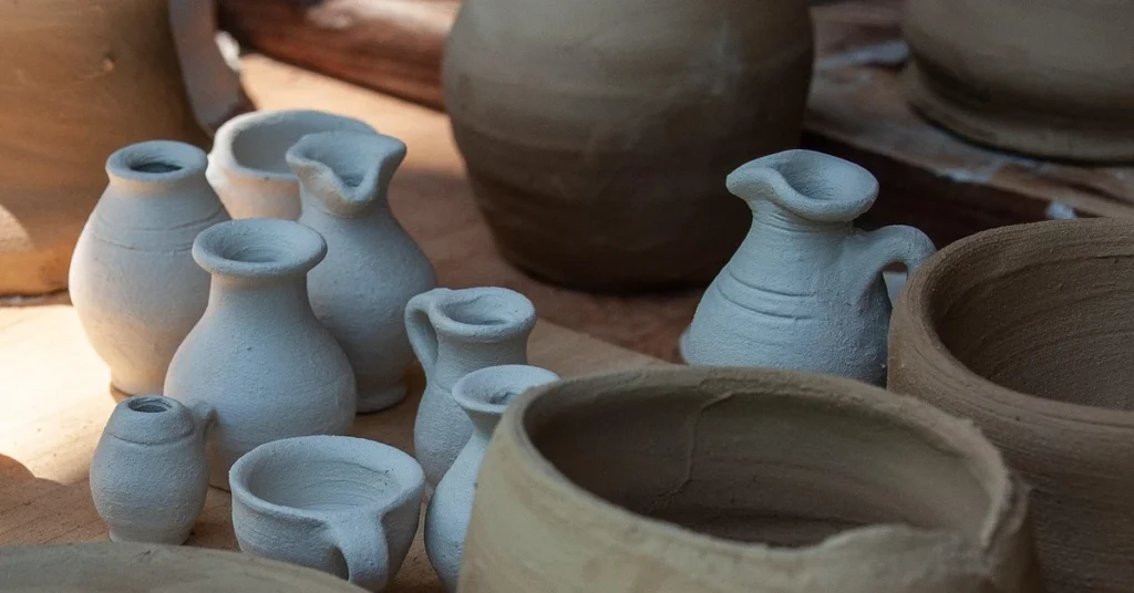 a couple of clay vases