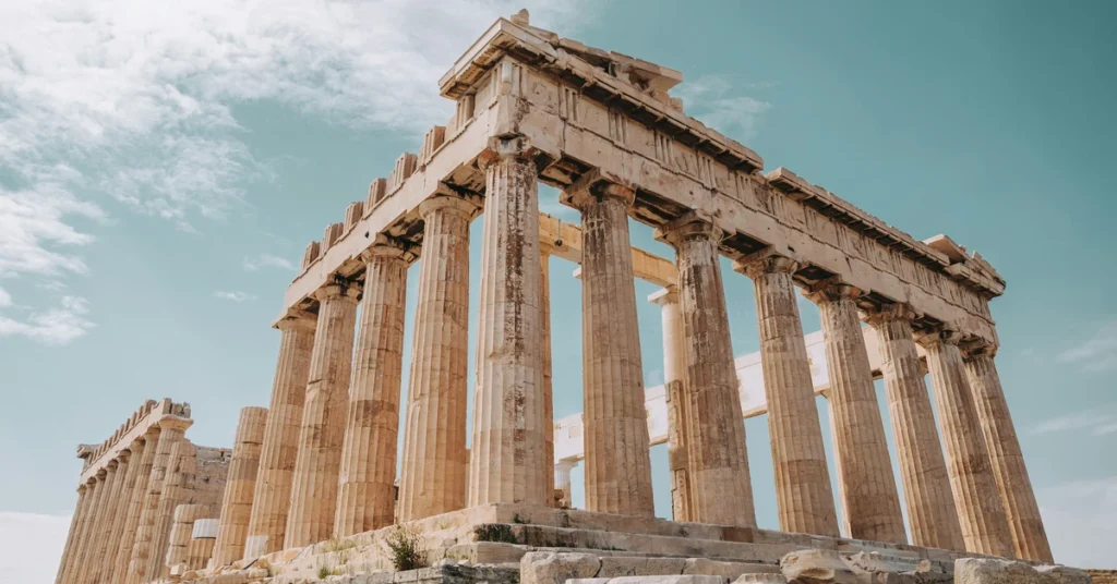 The Parthenon temple under blue sky on the Acropolis hill in Athens