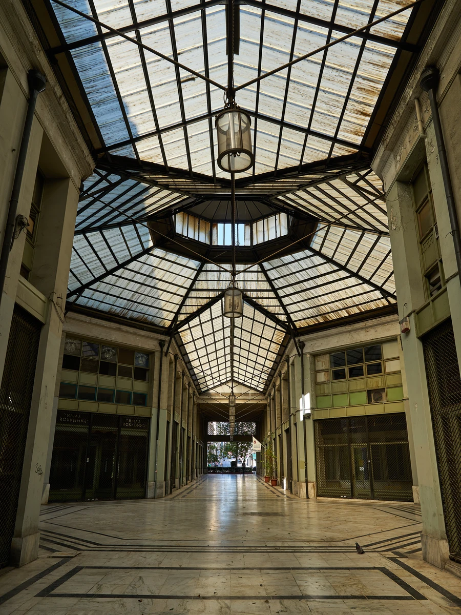 Historic glass-roofed arcade of Stoa Arsakeiou on Stadiou Street in Athens