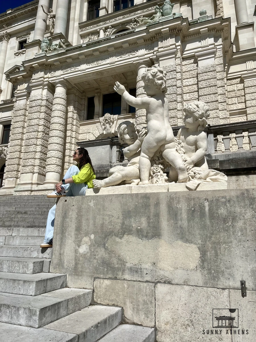 Marble statues and the entrance facade of the Kunsthistorisches Museum in Vienna