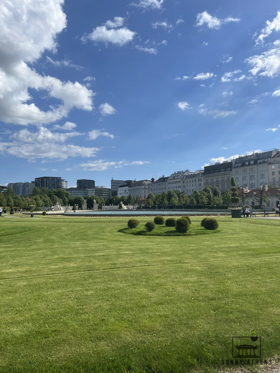 The reflecting pond and green gardens in front of the Lower Belvedere Palace in Vienna