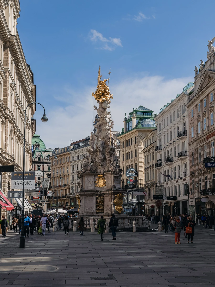 The baroque Column of the Pest (Pestsäule) on Graben pedestrian street in central Vienna