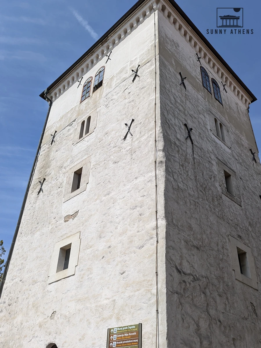 13th-century stone Lotrscak Tower guarding the Upper Town with the midday cannon window