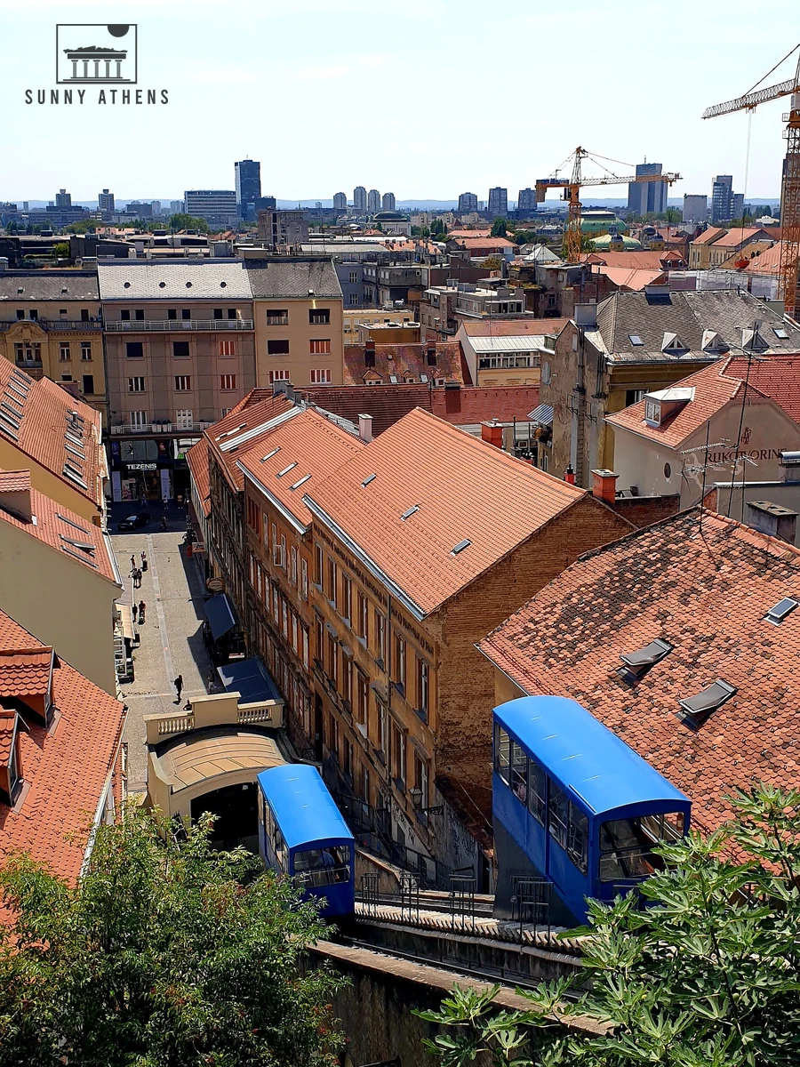 Historic blue funicular carriage climbing the 66-meter steep track between Upper and Lower Town