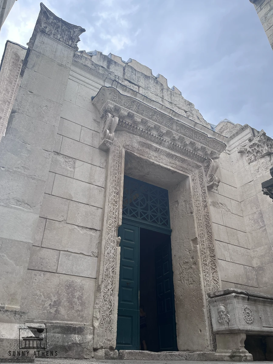 Carved stone portal and entrance door of the ancient Roman Temple of Jupiter in Split