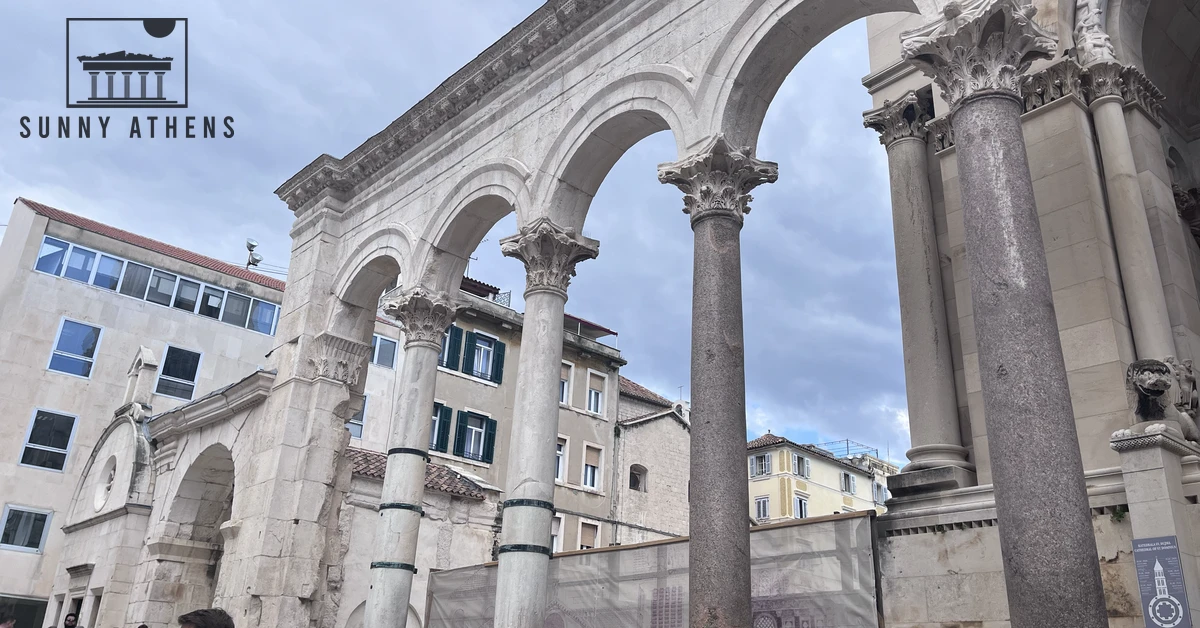 Ancient Roman colonnade and stone arches surrounding the central Peristyle courtyard in Diocletian's Palace